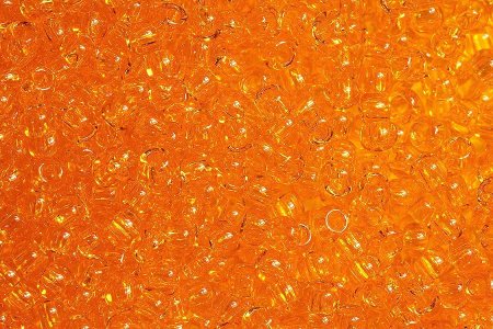 Бисер японский круглый ТОНО 11/0 полупрозрачный светло-оранжевый (10), 10г
